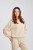 Bluza damska Sweatshirt Sandstone, widok na modelce z ręką opartą na biodrze